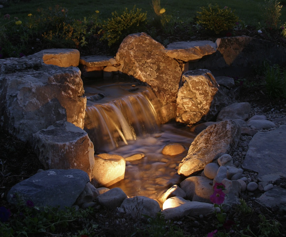 Water feature glows because of water proof light placed directly into the water