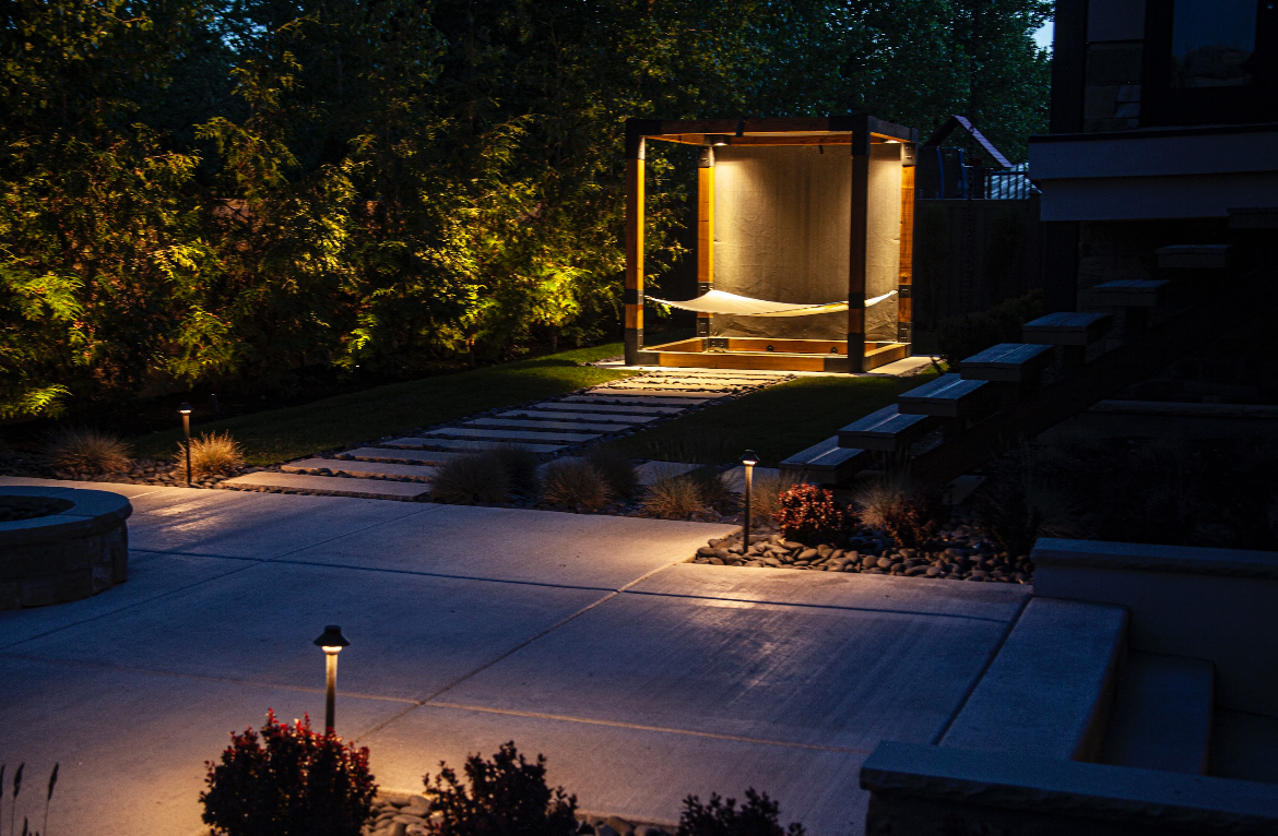 Path Lighting and Pergola lighting illuminating outdoor living space